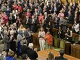 Pakistani activist and Nobel Peace Prize winner Malala Yousafzai, centre, reacts as she's paid tribute in the House of Commons on Parliament Hill in Ottawa on Wednesday. Just who was in the audience?