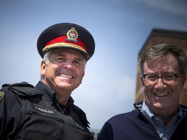 Police Chief Charles Bordeleau and Mayor Jim Watson before the community safety march kicked off on Jasmine Crescent Sunday April 9, 2017.   Ashley Fraser/Postmedia
