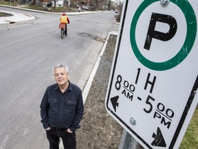 Resident Ron Elliott is concerned about a proposal to eliminate 97 street parking spots along Spencer Street and put in painted bike lanes.