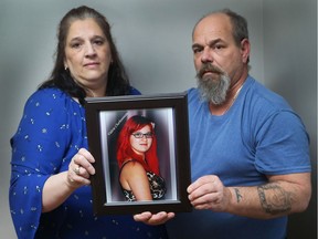 Sylvie Charbonneau and Rick Charbonneau hold a photo of their daughter, Valerie, who was killed in a car crash in 2013.