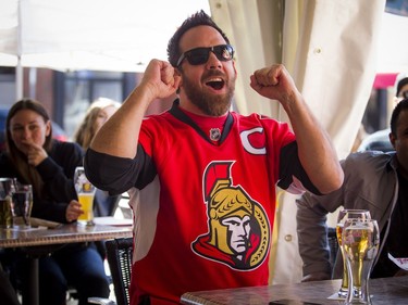 Ron Major gets right into the game at St. Louis Bar and Grill on Elgin along Sens Mile Sunday April 23, 2017.   Ashley Fraser/Postmedia
