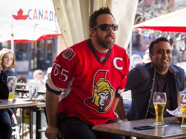 Ron Major gets right into the game at St. Louis Bar and Grill on Elgin along Sens Mile Sunday April 23, 2017.   Ashley Fraser/Postmedia
