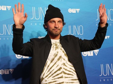 Sam Roberts poses as musical talent take to the red carpet at the Juno Awards held on Sunday at the Canadian Tire Centre.