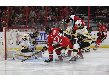 The Ottawa Senators' Viktor Stalberg looks for the puck as he moves in on the Boston goalie Tuukka Rask in the first period.