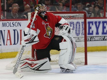 Ottawa Senators Craig Anderson looks dejected after the Boston Bruins scored on him in the second period.