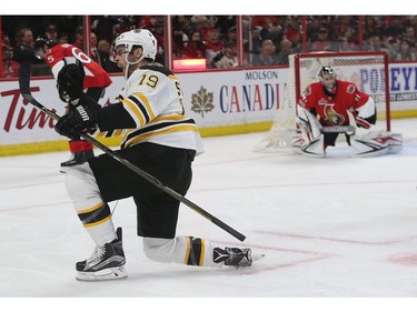 The Boston Bruins' Drew Stafford celebrates his second-period goal against Craig Anderson and the Ottawa Senators.