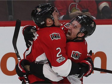 The Senators' Dion Phaneuf gets a bearhug from Mark Stone after scoring in overtime to give Ottawa a 4-3 victory over Boston in Game 2 at the Canadian Tire Centre on Saturday, April 15, 2017.