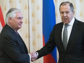 US Secretary of State Rex Tillerson, left, and Russian Foreign Minister Sergey Lavrov shake hands prior to their talks in Moscow, Russia, Wednesday, April 12, 2017. Tillerson's Moscow talks hinge on new US leverage over Syria.
