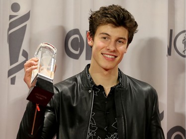 Shawn Mendes with his JUNO backstage at the Juno Awards held on Sunday at the Canadian Tire Centre.
