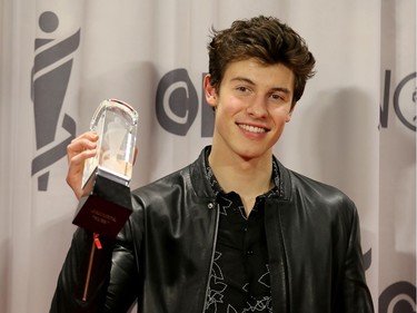 Shawn Mendes with his JUNO backstage at the Juno Awards held on Sunday at the Canadian Tire Centre.