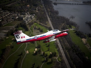 Snowbird 11 Co-ordinator: Captain Paul Faulkner took Postmedia photographer for a flight Saturday April 29, 2017. Snowbird 10 Co-ordinator: Captain Blake McNaughton was in a second plane flying with Faulkner. The Snowbirds are in the Ottawa Gatineau region for the Aero150 air show being held at the Gatineau Ottawa Executive Airport.  Ashley Fraser/Postmedia