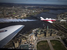 The Snowbirds fly over Parliament Hill. They treat passengers better than United does.