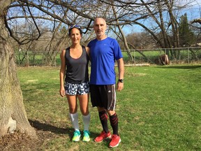 Teachers Lisa and Brian Schmidt were running along the Ottawa River Pathway on Sunday when they saw two men in a canoe tip into the swollen river. Brian Schmidt risked his life to rescue them from the ice-cold water.