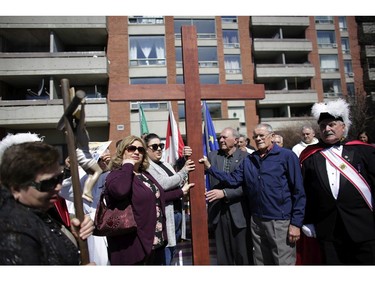 The Eleventh Station of the Cross at the Italian Community Centre. Parishioners from St. Anthony's church performed the Way of the Cross during Good Friday in Little Italy on April 14, 2017.