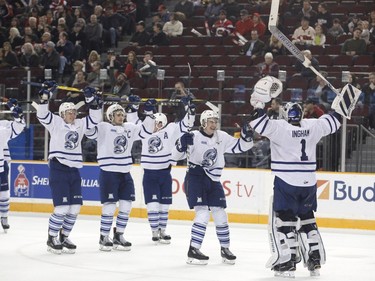 The Mississauga Steelheads celebrate a 5-1 victory over the Ottawa 67s at the end of their OHL playoff hockey game at TD Place in Ottawa on Sunday, April 2, 2017.   (Patrick Doyle)  ORG XMIT: 0402 67s 09