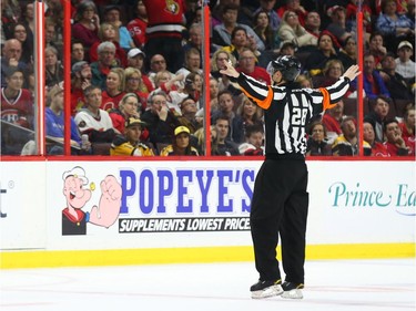 The referee calls a no goal by the Boston Bruins against the Ottawa Senators during first period of overtime.