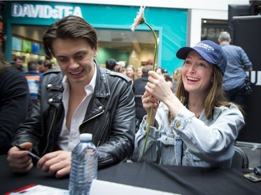 July Talk members Peter Dreimanis and Leah Fay, who graciously accepts a flower from a fan.