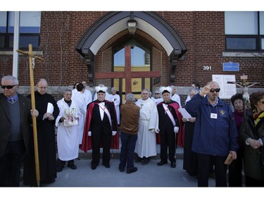 The Second Station of the Cross at St. Anthony School. Parishioners from St. Anthony's church performed the Way of the Cross during Good Friday in Little Italy on April 14, 2017.