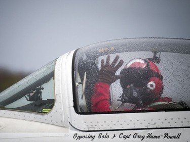 The Snowbirds took part in the Aero150 air show that was held at the Gatineau-Ottawa Executive Airport Sunday April 30, 2017. Snowbird 8 Opposing Solo: Captain Greg Hume-Powell waves before hitting the runway.   Ashley Fraser/Postmedia