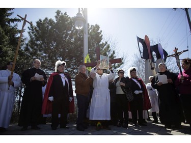 The Tenth Station of the Cross at Gladstone Ave. and Preston St. Parishioners from St. Anthony's church performed the Way of the Cross during Good Friday in Little Italy on April 14, 2017.