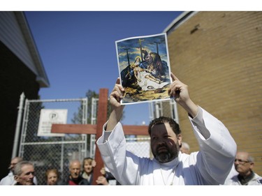 The Thirteenth Station of the Cross at St. Anthony's Children's Centre. Parishioners from St. Anthony's church performed the Way of the Cross during Good Friday in Little Italy on April 14, 2017.