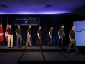 The top 17 candidates to be the next Canadian Space Agency astronaut, leave the stage during a press conference in Toronto on Monday, April 24, 2017.