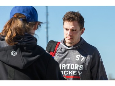 Tommy Wingels signs an autograph for a fan as the Ottawa Senators practice at the Bell Sensplex in advance of their next NHL playoff game against the Boston Bruins on Saturday. The Bruins are up 1-0 in a best of seven series.