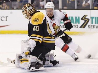 Boston Bruins' Tuukka Rask (40), of Finland, blocks a shot by Ottawa Senators' Mark Stone (61) during the first period in game six of a first-round NHL hockey Stanley Cup playoff series, Sunday, April 23, 2017, in Boston.