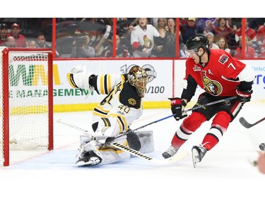 Tuukka Rask of the Boston Bruins stops the breakaway of Kyle Turris of the Ottawa Senators during double overtime.