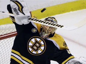 Bruins goalie Tuukka Rask makes a stick save during a game against the Senators on April 6. Rask's overall numbers match or surpass those of Ottawa's Craig Anderson, Don Brennan writes.