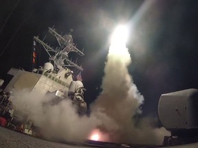 MEDITERRANEAN SEA - APRIL 7:  In this handout provided by the U.S. Navy,The guided-missile destroyer USS Porter fires a Tomahawk land attack missile on April 7, 2017 in the Mediterranean Sea. The USS Porter was one of two destroyers that fired a total of 59 cruise missiles at a Syrian military airfield in retaliation for a chemical attack that killed scores of civilians this week. The attack was the first direct U.S. assault on Syria and the government of President Bashar al-Assad in the six-year war there.