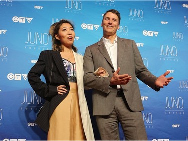 Vancouver Mayor Gregor Robertson and Wanting Qu pose as musical talent take to the red carpet at the Juno Awards held on Sunday at the Canadian Tire Centre.