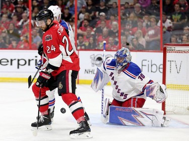 Viktor Stalberg looks for the loose puck in front of Henrik Lundqvist in the third period.