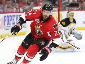 Viktor Stalberg of the Senators skates past the net of Bruins goalie Tuukka Rask in the first period of Friday's game. Stalberg left the game because of injury during overtime. Jean Levac/Postmedia