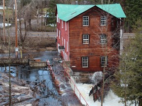 Water  from Brennan's Creek floods through historic mill in Killaloe this week. Lynn Flokstra photo.