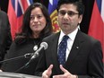 Ontario Attorney General Yasir Naqvi speaks at a press conference as Minister of Justice and Attorney General of Canada Jody Wilson-Raybould, centre, and Northwest Territories Minister of Justice Louis Sebert look on, at the Federal-Provincial-Territorial Meeting of Ministers Responsible for Justice in Gatineau on Friday, April 28, 2017.