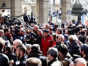 Former far-right National Front leader Jean-Marie Le Pen arrives for a march to the statue of Joan of Arc, Monday May 1, 2017, in Paris. France&#039;s tense presidential race is colliding with May Day labor marches in a campaign dominated by worries over jobs and seen as a test of populism&#039;s global appeal. (AP Photo/Kamil Zihnioglu)