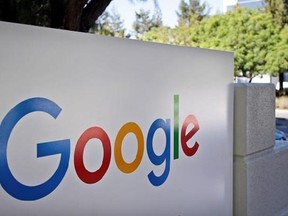 FILE - This Oct. 20, 2015, file photo, shows a sign outside Google headquarters in Mountain View, Calif. Google is warning users Wednesday, May 3, 2017, to beware of a phishing scam spread by a fraudulent invitation to share a Google Doc. (AP Photo/Marcio Jose Sanchez, File)