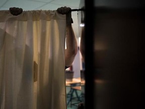 A worker prepares the booths at a polling station in Saint Cloud, outside Paris, France, Saturday, May 6, 2017. Voting for France&#039;s next president starts in overseas territories and French embassies abroad, as a blackout on campaigning descends so that voters can reflect on whether to entrust their country&#039;s future to independent Emmanuel Macron or far-right populist Marine Le Pen. (AP Photo/Kamil Zihnioglu)