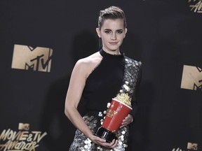 CORRECTS PHOTOGRAPHER FROM CHRIS PIZZELLO TO RICHARD SHOTWELL -Emma Watson poses in the press room with the award for best actor in a movie for "Beauty and the Beast" at the MTV Movie and TV Awards at the Shrine Auditorium on Sunday, May 7, 2017, in Los Angeles. (Photo by Richard Shotwell/Invision/AP) ORG XMIT: CADC103