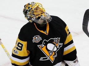 Pittsburgh Penguins goalie Marc-Andre Fleury reacts to allowing a goal to Washington Capitals&#039; John Carlson during the third period of Game 6 in an NHL Stanley Cup Eastern Conference semifinal hockey game in Pittsburgh, Monday, May 8, 2017. The Capitals won 5-2.