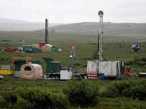 FILE - In this July 13, 2007 file photo, workers with the Pebble Mine project test drill in the Bristol Bay region of Alaska near the village of Iliamma. The Trump administration settled a lawsuit Friday, May 12, 2017, over the proposed development of a massive gold and copper mine at the headwaters of one of Alaska&#039;s premier salmon fisheries. The Environmental Protection Agency settled the long-running case with the Pebble Limited Partnership, agreeing to allow the Canadian-owned company to see