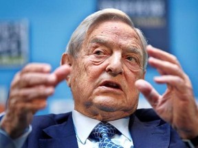 FILE - In this file photo dated Saturday, Sept. 24, 2011, chairman, Soros Fund Management, George Soros speaks during a forum at the IMF/World Bank annual meetings in Washington. billionaire financier and philanthropist Soros says his fight against intolerance is rooted in his own experience of living through the Nazi occupation of Hungary, but some officials in Central Europe have accused him of using his money to force his liberal values on their nascent democratic societies. (AP Photo Manuel