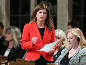 Health Minister Rona Ambrose stands in the House of Commons during question period on Parliament Hill in Ottawa on Thursday, June 11, 2015. THE CANADIAN PRESS/Fred Chartrand