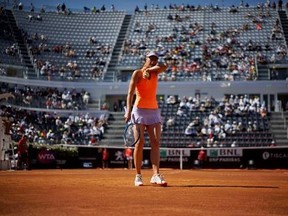 Maria Sharapova of Russia wipes sweat form her face during a tennis match against Christina Mchale of the United States, at the Italian Open tennis tournament, in Rome, Monday, May 15, 2017. (AP Photo/Andrew Medichini)