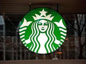 FILE - This Thursday, Jan. 12, 2017, file photo shows the sign in the window of a Starbucks in Pittsburgh. On Tuesday, May 16, 2017, some Starbucks customers said on social media that they got free drinks because of an outage of the chain&#039;s registers. The company said the outage was the result of an overnight technology update. (AP Photo/Gene J. Puskar, File)