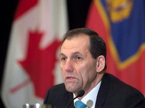 Alphonse MacNeil, a retired RCMP assistant commissioner, fields questions after the release of the review of the shooting rampage in Moncton that killed three Mounties and wounded two others last year, in Moncton, N.B. on Friday, Jan. 16, 2015. MacNeil says no one took command during a 2014 shooting rampage in Moncton, N.B., so officers were forced to make their own decisions amid the chaos. THE CANADIAN PRESS/Andrew Vaughan