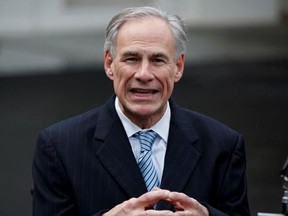 FILE - In this March 24, 2017, file photo, Texas Gov. Greg Abbott talks to reporters outside the White House in Washington. A transgender &ampquot;bathroom bill&ampquot; reminiscent of one in North Carolina that caused a national uproar now appears to be on a fast-track to becoming law in Texas - though it may only apply to public schools. Abbott has said he wants to sign a bathroom bill into law. (AP Photo/Evan Vucci, File)