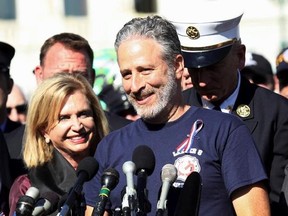 FILE - In this Sept. 16, 2015 file photo, Jon Stewart, accompanied by Rep. Carolyn Maloney, D-N,Y., and New York City first responders speaks during a rally on Capitol Hill in Washington. HBO says it&#039;s scrapping a Web-delivered venture it was developing with Stewart. In a statement Wednesday, May 24, 2017, the network said the short-form digital animated project had proved too technically difficult for a quick turnaround. The animated series would have allowed Stewart to comment on daily breakin