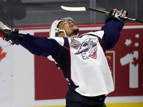 Windsor Spitfires left wing Jeremiah Addison (10) celebrates his third gaol of the game against the Erie Otters during third period Memorial Cup round robin hockey action in Windsor, Ont., on Wednesday, May 24, 2017. THE CANADIAN PRESS/Adrian Wyld